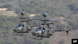 美國陸軍的“基奧瓦勇士”直升機在朝鮮半島參加美韓聯合實彈演習。（資料圖片）