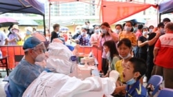 本土新冠病毒傳播大增 廣州要求所有離境者出示檢測陰性證明