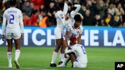 Haiti players react at the end of the Women's World Cup Group D soccer match between China and Haiti in Adelaide, Australia, July 28, 2023. China won 1-0.