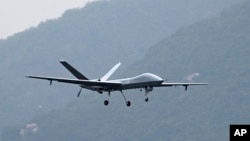 2022年11月5日，中國解放軍的攻擊-2型無人機在廣東為珠海空展進行飛行訓練。