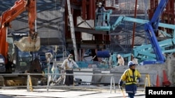 2016年1月22日日本東京商業區工地工作的工人