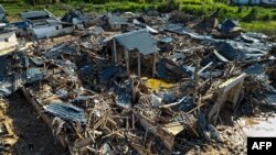 中国广东梅州洪水受灾地区鸟瞰。（2024年6月21日）