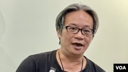 清潔服務業職工會會長黃迺元表示，實施垃圾徵費令前線清潔工人面對法律風險，工作時壓力大增。(美國之音照片)