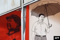 資料照：北京街頭宣傳習近平的宣傳畫。 （2018年2月26日）