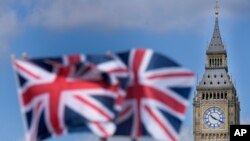 資料照：英國國會大廈與英國國旗