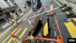 香港受海葵颱風殘餘環流影響9月7日晚開始下大暴雨，直至9月11日多區仍間歇有大暴雨，多處馬路塌陷。(美國之音/湯惠芸)