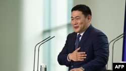 资料照片：蒙古总理奥云额尔登2022年10月14日在访问德国期间的新闻发布会上。（法新社照片）