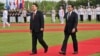 Japanese Prime Minister Fumio Kishida, right, and South Korean President Yoon Suk Yeol attend a welcoming ceremony at the presidential office in Seoul, May 7, 2023. 