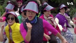 ກຸ່ມນັກເຕັ້ນຊາວອາເມຣິກັນ ເຊື້ອສາຍເກົາຫຼີ ສະຫຼອງການເປັນແມ່ຍິງໄວກາງຄົນ