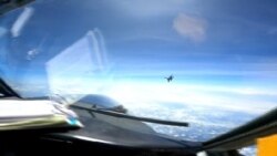 美印太司令部公佈視頻：中國戰機以“不專業”方式在南中國海上空攔截美國軍機