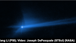 资料照片：近地小行星迪莫弗斯在试验中被撞击的情景。(2024年9月26日)