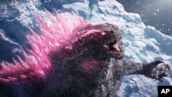 This image released by Warner Bros Pictures shows Godzilla in a scene from "Godzilla X Kong: The New Empire." (Warner Bros. Pictures via AP)