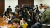 Foreign and local journalists report at a news conference at the Ministry of Foreign Affairs office in Beijing, China, April 26, 2023. 