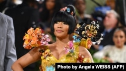 FILE - U.S. rapper Nicki Minaj arrives for the 2024 Met Gala at the Metropolitan Museum of Art on May 6, 2024, in New York. The Gala's 2024 theme is 'Sleeping Beauties: Reawakening Fashion.'