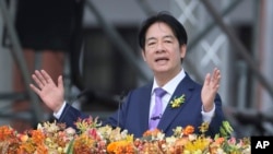 ແຟ້ມຮູບ-ປະທານາທິບໍດີໄຕ້ຫວັນ ທ່ານລາຍ ຊິງ-ເຕ ກ່າວຄໍາປາໄສໃນລະຫວ່າງພິທີເຂົ້າຮັບຕໍາແໜ່ງໃນນະຄອນຫຼວງໄທເປ, ໄຕ້ຫວັນ, ວັນທີ 20 ພຶດສະພາ 2024. 