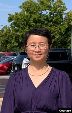 丁家喜的妻子羅勝春