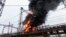 Flames and smoke rise from a blaze at an electricity facility after a Russian attack in Kharkiv, Ukraine, March 22, 2024. Attacks on energy facilities in the Kharkiv region caused blackouts and disrupted critical air-raid siren systems.