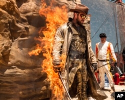 This image released by Universal Pictures shows stuntman Ben Jenkin on the set of 'The Fall Guy.' (Eric Laciste/Universal Pictures via AP)