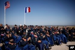 U.S. veterans attend the commemoration organized by the Best Defense Foundation at Utah Beach near Sainte-Marie-du-Mont, Normandy, June 4, 2023,