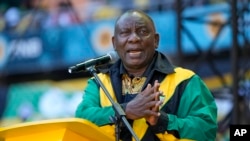 FILE - South African President Cyril Ramaphosa addresses African National Congress supporters in Johannesburg, May 25, 2024. He says his government had not confiscated any land, and he looks forward to engaging with Trump to foster a better understanding over the matter.