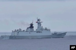 台湾海岸警卫队发布照片显示，一艘被识别为中国海军导弹护卫舰FFG 548舰只出现在台湾北部彭佳屿附近。（2024年5月23日）