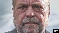 French Justice Minister Eric Dupond-Moretti looks on as he speaks to journalists at the Caen-Ifs prison in Ifs, near Caen, northwestern France, on May 14, 2024.