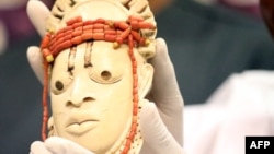 A close-up of a Benin bronze artifact at the Nigerian Ministry of Foreign Affairs in Abuja, Nigeria, on Dec. 20, 2022, the same day Germany returned several artifacts to Nigeria.