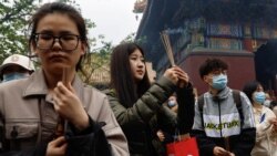 “清零政策”給中國沉重打擊未完全復甦 大學畢業生謀職難擠爆寺廟祈福