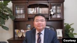 位於美國的時評人王劍