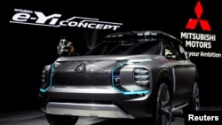 資料照：上海汽車展的日產汽車展台 （2019年4月16日）