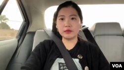 香港民主委员会(HKDC)总监郭凤仪今(15日)身穿“光复香港 时代革命”上衣，准备出席示威。