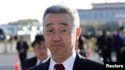 资料照：中共前领导人胡锦涛之子、时任浙江丽水市委书记胡海峰前往北京人大会堂出席全国人大会议闭幕式。（2019年3月15日）