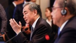 中共外交主管王毅在雅加達先後會晤美國國務卿與俄羅斯外長