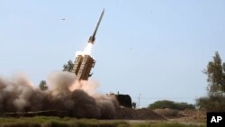 Запуск ракеты во время военных учений на юге Ирана, архивное фото (Иранская армия через AP)