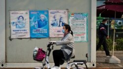 中國新冠疫情捲土重來政府躺平民眾淡然