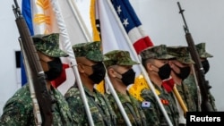 美國、菲律賓、日本和南韓在菲律賓達義市舉行聯合軍演開幕式。 （路透社2022年10月3日）