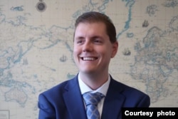 “国际税务和投资中心”国际项目部主任何伟龙。（照片由本人提供）