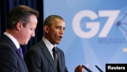 美國總統奧巴馬(右)6月5日在布魯塞爾峰會上與英國首相卡梅倫。