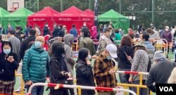 香港特首林郑月娥形容推行全民强制检测社会要付出很大代价，但防疫效果可能不大，宣布暂缓推行全民强检 (美国之音/汤惠芸)