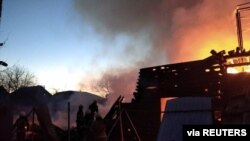 俄羅斯軍隊2022年3月16日炸毀了烏克蘭首都基輔一棟住宅樓（烏克蘭政府提供照片）