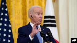 2021年5月21日，拜登總統和南韓來訪總統文在寅在白宮舉行的聯合記者會上答記者問。