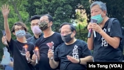 已經解散的香港支聯會前正副主席李卓人(右一)、何俊仁(右二)，被控國安法”煽動顛覆國家政權罪”。(美國之音/湯惠芸)