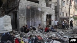 资料照片：加沙南部拉法城的苏尔坦社区遭到以色列空袭。（2024年5月20日）