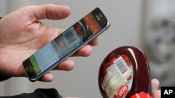 瑞典無人售貨商店的顧客使用移動支付（2016年1月27日）