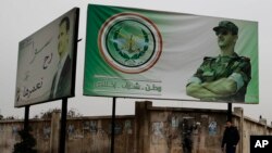 叙利亚阿勒颇街头领导人阿萨德的广告牌(资料照)