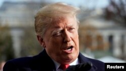 美國總統特朗普在白宮南草坪對媒體講話。(2018年12月11日)