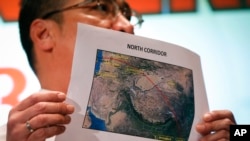 馬來西亞代理交通部長希山慕丁在記者會上