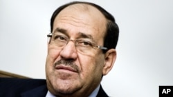 2014年6月23日伊拉克總理馬利基在巴格達會見美國國務卿克里