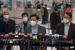 中港重開邊境的第一天，香港特首李家超在落馬洲邊境檢查站講話。（2023年1月8日）