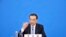 Chinese Premier Li Keqiang speaks during a press conference after the end of the closing session of China's National People's Congress (NPC) at the Great Hall of the People in Beijing, March 11, 2022. 